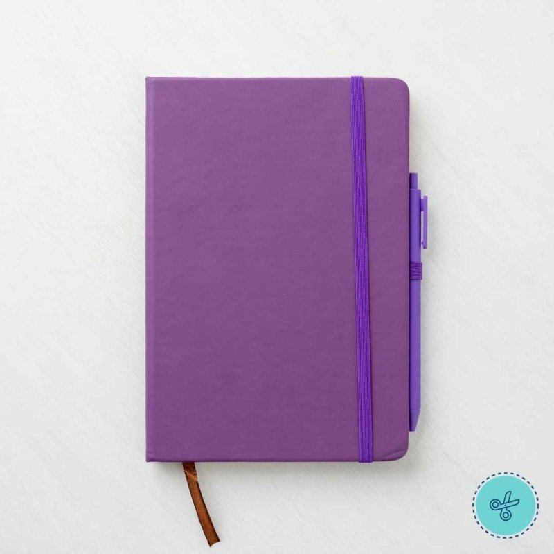 LIBRETA DE RAYAS MORADO Y BOLIGRAFO 8.5" X 5.5"