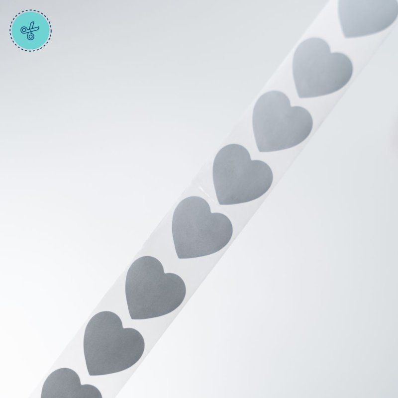 STICKER SEGUR. CORAZON PLATEADO (RASPAITO), 300 UND, 1"