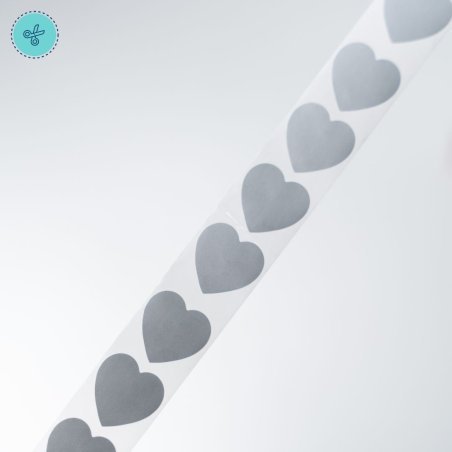 STICKER SEGUR. CORAZON PLATEADO (RASPAITO), 300 UND, 1"